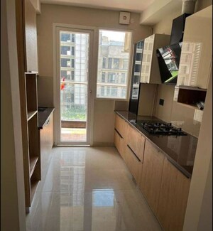 Kitchen in 3 BHK Apartment at The Ananta Aspire, Utrathiya – for Rent