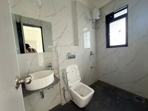 Bathroom in 3 BHK Apartment at Dhamji Shamji Mahavir Spring Tulip Phase 1, Pokhran Road No Two – for Rent