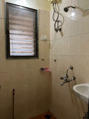 Bathroom in 1 BHK Apartment at Gayatri Corner, Kandivali East – for Rent