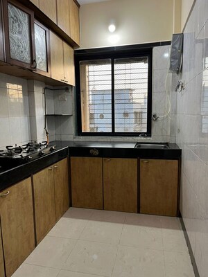Kitchen in 1 BHK Apartment at Gayatri Corner, Kandivali East – for Rent