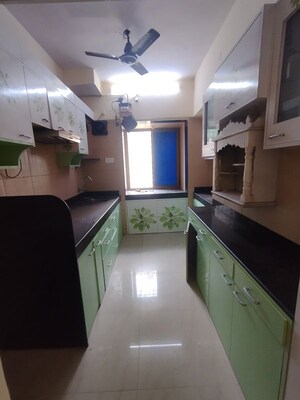 Kitchen in 2 BHK Apartment at Harmony Residency Owale, Owale – for Rent