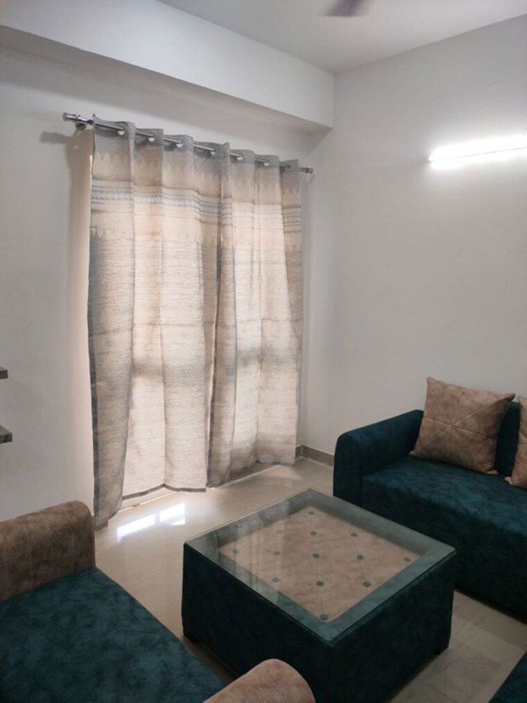 Living Room, nimbus-the-golden-palm 2.5 Bedroom 1200 Sq.Ft. Apartment In Sector 168 Noida 10639660