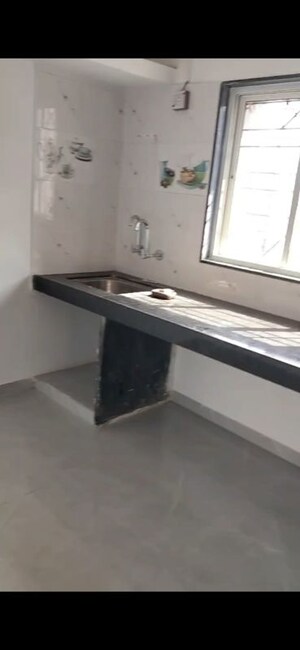 Kitchen in 1 BHK Apartment at Karve Nagar – for Sale