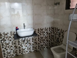 Bathroom in 3 BHK Apartment at Lok Sarita, Andheri East – for Rent