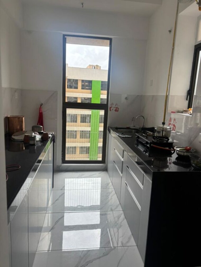 Kitchen, raymond-ten-x-habitat 2 Bedroom 595 Sq.Ft. Apartment In Pokhran Road No Two Thane 10639751