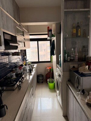 Kitchen in 2 BHK Apartment at Kanakia Rainforest, Andheri East – for Rent