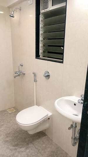 Bathroom in 1 BHK Apartment at Romell Orbis, Andheri East – for Rent