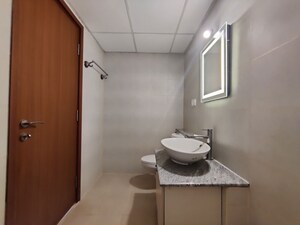 Bathroom in  Apartment at Bhartiya Nikoo Homes Phase 2, Thanisandra Main Road – for Rent