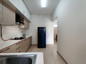 Kitchen in  Apartment at Bhartiya Nikoo Homes Phase 2, Thanisandra Main Road – for Rent