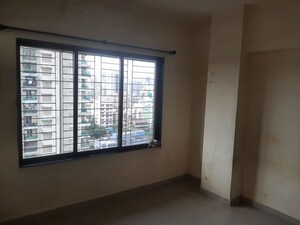 Room in 2 BHK Apartment at Mahindra Mahendra Gesco, Goregaon West – for Rent