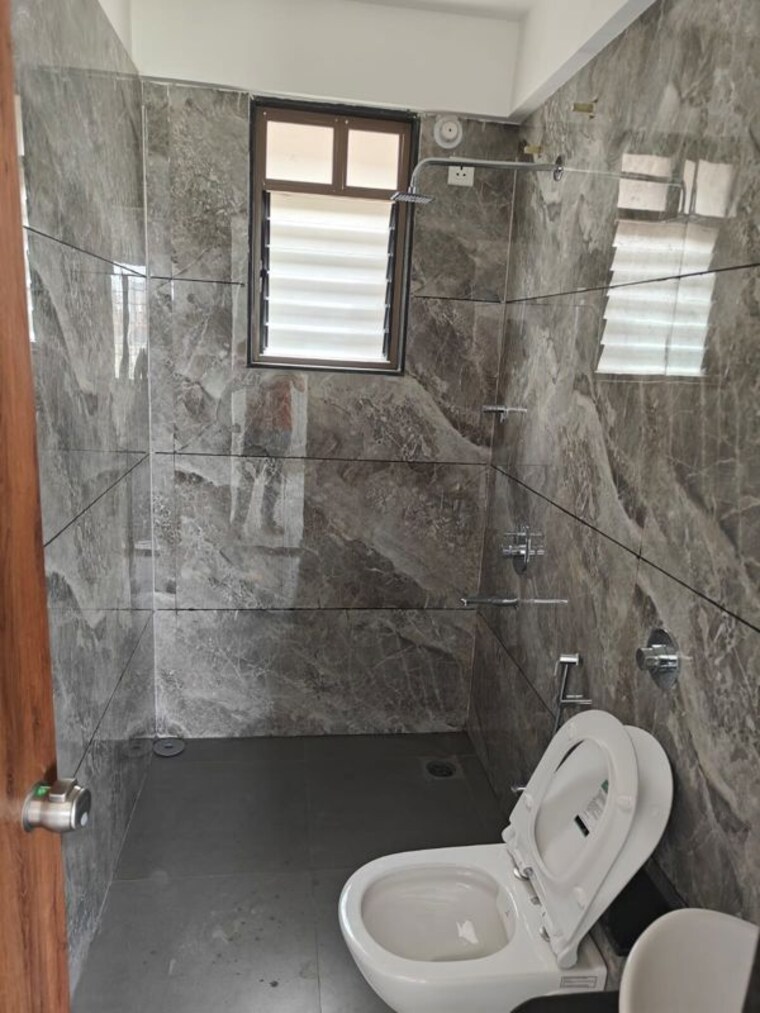 Bathroom, renuka-panchtattva 2 Bedroom 826 Sq.Ft. Apartment In Tathawade Pune 10639854