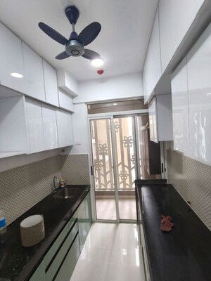 Kitchen in 2 BHK Apartment at Lodha Codename Premier, Dombivli East – for Rent