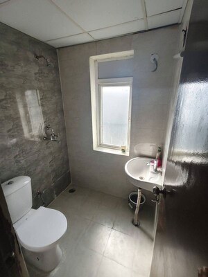 Bathroom in 2.5 BHK Apartment at Samridhi Grand Avenue, Tech Zone 4 Greater Noida – for Rent