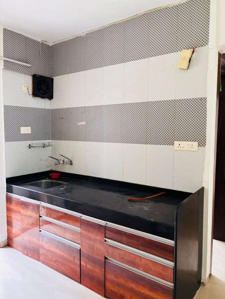 Kitchen, imperal-alassio-residency 2 Bedroom 790 Sq.Ft. Apartment In Ravet Pune 10639994