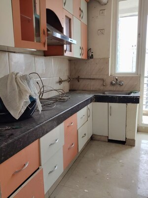 Kitchen in 2 BHK Apartment at Great Value Sharanam, Sector 107 – for Rent