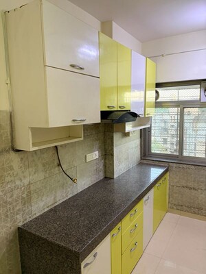 Kitchen in 3 BHK Apartment at Kalpataru Hills Phase II, Manpada – for Rent