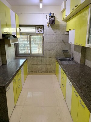 Kitchen in 3 BHK Apartment at Kalpataru Hills Phase II, Manpada – for Rent