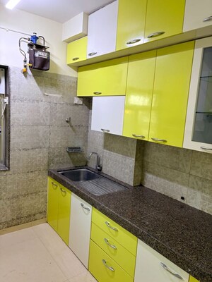 Kitchen in 3 BHK Apartment at Kalpataru Hills Phase II, Manpada – for Rent
