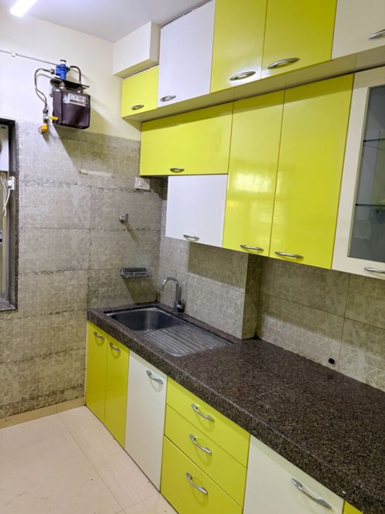 Kitchen, kalpataru-hills-phase-ii 3 Bedroom 1050 Sq.Ft. Apartment In Manpada Thane 10640076