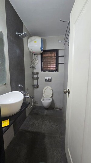 Bathroom in 3 BHK Apartment at Happy Valley, Manpada – for Rent