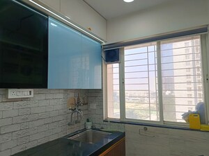 Kitchen in 3 BHK Apartment at Kunal Iconia, Mamurdi – for Rent