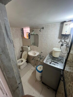 Bathroom in 2 BHK Apartment at Dimples Gayatri Avenue, Kandivali East – for Rent