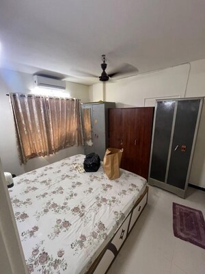 Bedroom in 2 BHK Apartment at Dimples Gayatri Avenue, Kandivali East – for Rent