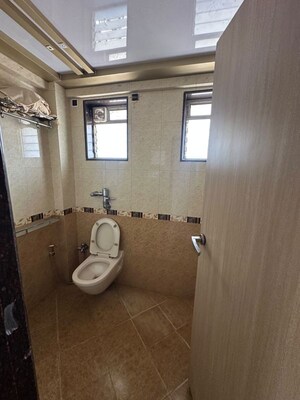 Bathroom in 3 BHK Apartment at Laxman Jhoola Apartment, Andheri West – for Rent