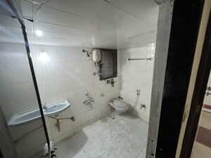 Bathroom in 3 BHK Apartment at Sonal Link Residency, Malad West – for Rent