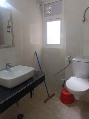 Bathroom in 3 BHK Apartment at Shri Radha Aqua Garden, Sector 16b Greater Noida – for Rent