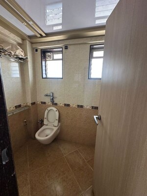 Bathroom in 3 BHK Apartment at Awadhoot CHS, Andheri West – for Rent