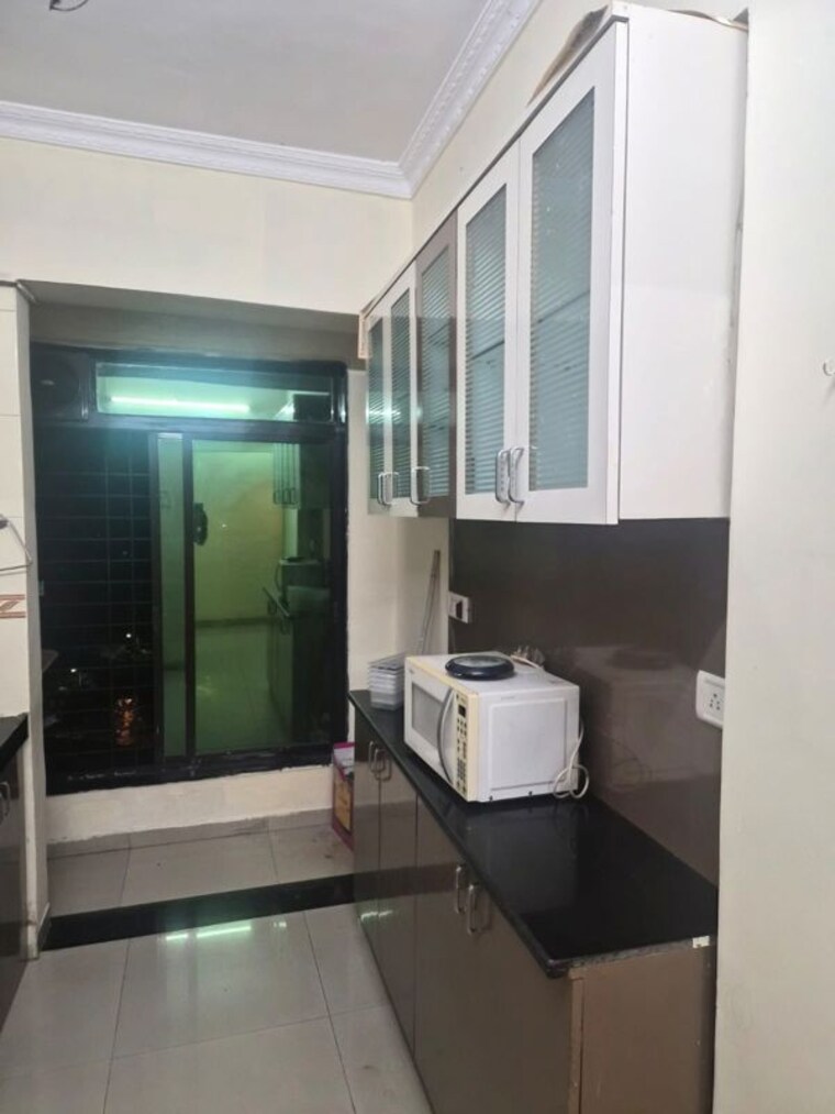 Kitchen, national-sicily-marvel 2 Bedroom 1050 Sq.Ft. Apartment In Kopar Khairane Navi Mumbai 10640408