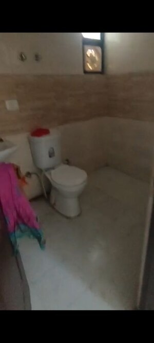 Bathroom in 2 BHK Apartment at Charms Castle, Raj Nagar Extension – for Rent