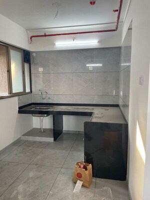 Kitchen in 2 BHK Apartment at Renuka Panchtattva, Tathawade – for Rent
