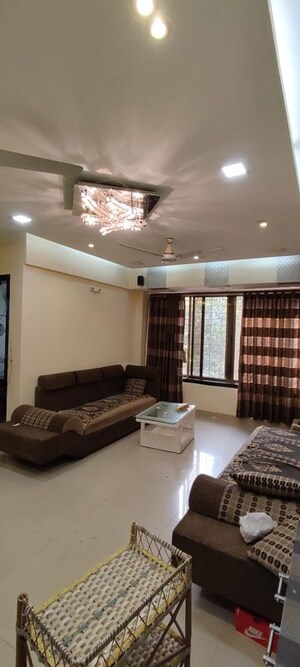 Living Room in 2 BHK Apartment at Shah Arcade II, Malad East – for Rent