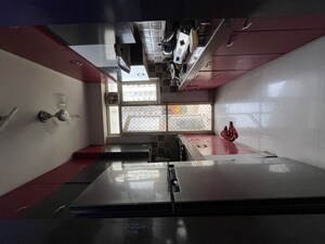 Kitchen in 2.5 BHK Apartment at Uninav Heights Phase I, Raj Nagar Extension – for Rent