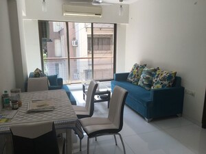 Living Room in 2 BHK Apartment at Khar West – for Rent