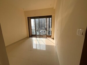 Room in 2 BHK Apartment at Transcon Triumph Tower, Andheri West – for Rent
