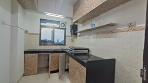 Kitchen in 2 BHK Apartment at Lokhandwala Harmony, Worli – for Rent