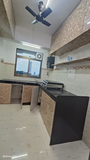 Kitchen in 2 BHK Apartment at Lokhandwala Harmony, Worli – for Rent