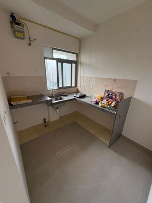 Kitchen in 1 BHK Apartment at Piramal Vaikunth, Balkum Pada – for Rent