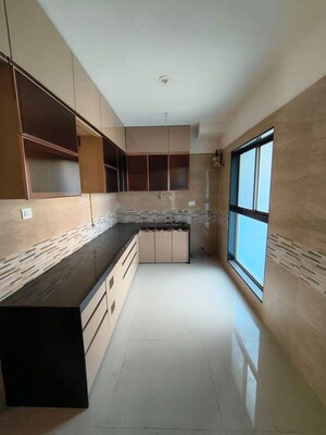 Kitchen in 2 BHK Apartment at Raj Infinia, Malad West – for Rent