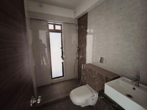Bathroom in 2 BHK Apartment at Raj Infinia, Malad West – for Rent