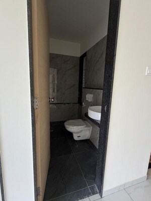 Bathroom in 1 BHK Apartment at MICL Aaradhya Prime Park, Mira Road – for Rent