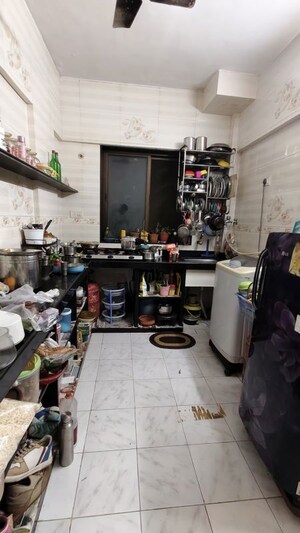 Kitchen in 1 BHK Apartment at Natwardham CHS, Malad West – for Sale