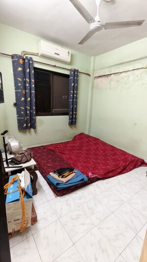 Bedroom in 1 BHK Apartment at Natwardham CHS, Malad West – for Sale