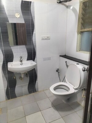 Bathroom in 2 BHK Apartment at Ravis Mani Mansion, Manikonda – for Rent