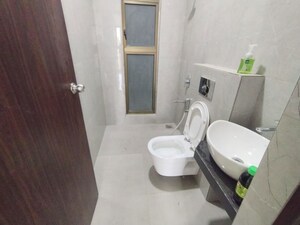 Bathroom in 1 BHK Apartment at Damji Shamji Mahavir Spring Tulip Phase 1, Pokhran Road No Two – for Rent