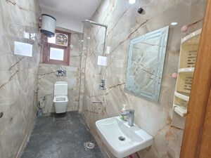 Bathroom in 1 BHK Builder Floor at Freedom Fighters Enclave – for Rent
