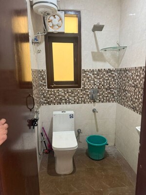 Bathroom in 2 BHK Builder Floor at Freedom Fighters Enclave – for Rent